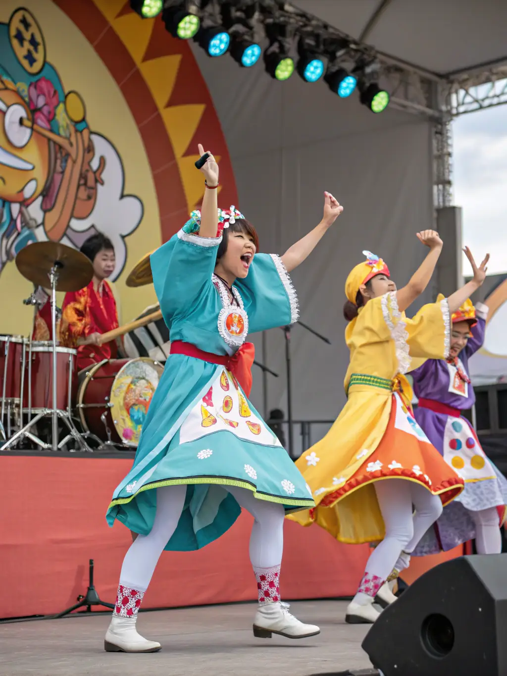 A dynamic image of a diverse group of performers on stage during an OPOPOP-organized cultural festival, highlighting the energy and inclusivity of the event.